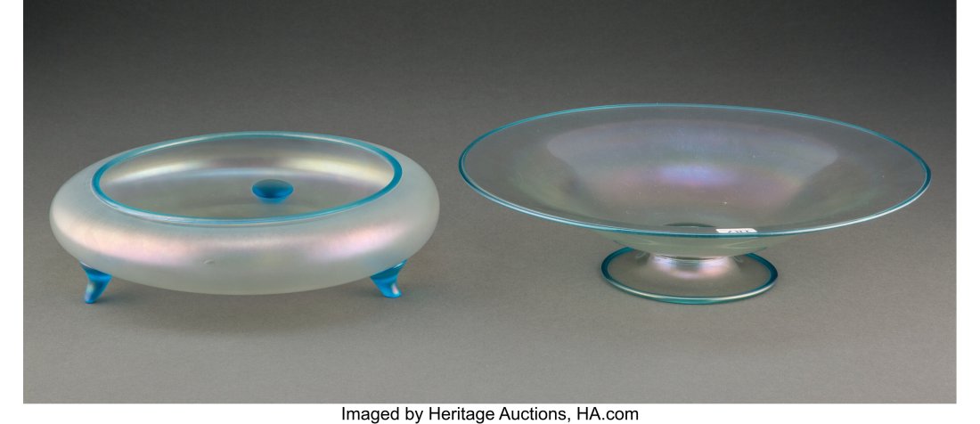 Two Steuben Iridescent Glass Bowls, early 20th c: Two Steuben Iridescent Glass Bowls, early 20th century 3 x 12 inches (7.6 x 30.5 cm)(largest) The tripod-footed bowl with paper Rockwell Gallery label to unders