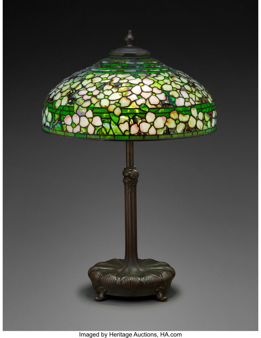 Tiffany Studios Leaded Glass and Patinated Bronz: Tiffany Studios Leaded Glass and Patinated Bronze Dogwood Table Lamp, circa 1910 Marks to shade: TIFFANY STUDIOS NEW YORK Marks to base: 29732 32-1/2 x 23 inches (82.