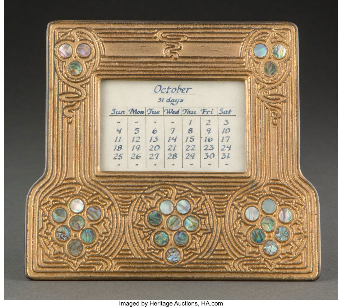 Tiffany Studios Gilt Bronze Abalone Perpetual Ca: Tiffany Studios Gilt Bronze Abalone Perpetual Calendar, circa 1920 Marks: TIFFANY STUDIOS, NEW YORK, 1166 5-3/4 inches (14.6 cm) LITERATURE: Alastair