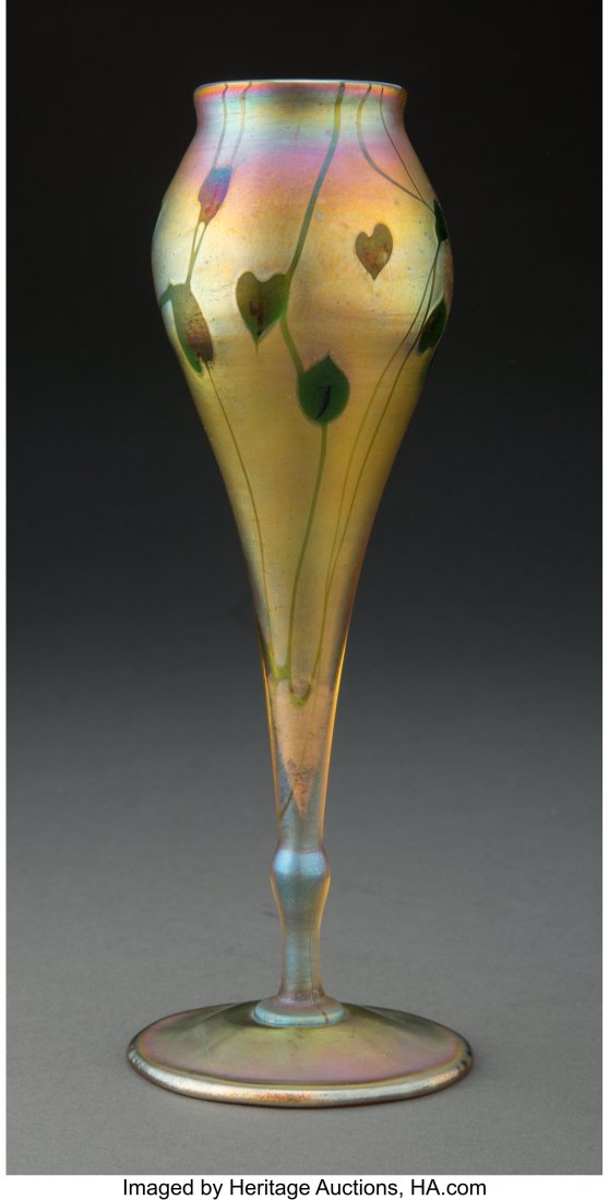 Tiffany Studios Decorated Favrile Glass Leaf and: Tiffany Studios Decorated Favrile Glass Leaf and Vine Vase, circa 1910 Marks: L.C. Tiffany-Favrile, 4042 G 9-1/4 inches (23.5 cm) LITERATURE: