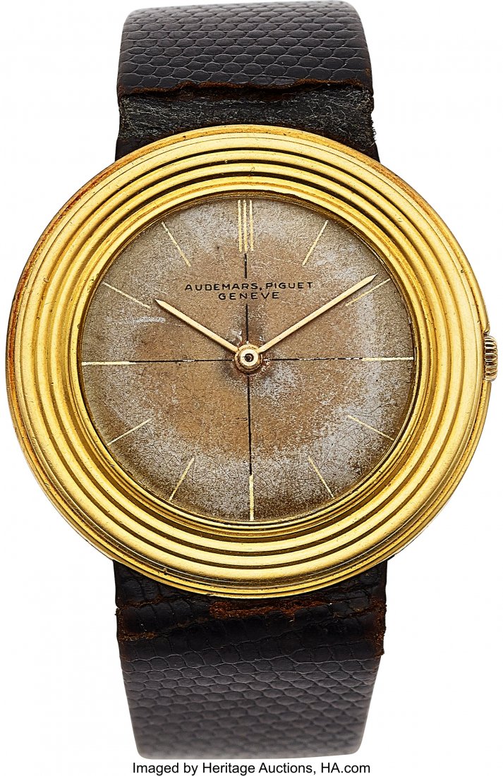 Audemars Piguet, 18k Yellow Gold Disco Volante, : Audemars Piguet, 18k Yellow Gold Disco Volante, Ref. 5096, circa 1950's Case: 35 mm, 18k yellow gold, two body, "disc" bezel with ridges, flat ca