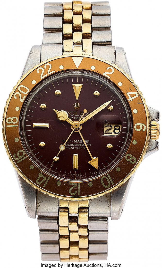 Rolex, Two Tone GMT-Master, Ref. 1675, Full Set,: Rolex, Two Tone GMT-Master, Ref. 1675, Full Set, Extra Bezel Inserts, circa 1970 Case: 40 mm, stainless steel and 14k yellow gold, three body&com