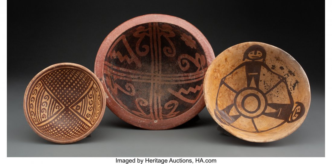 Three Carchi or Narino Pedestal Bowls Highlands: Three Carchi or Narino Pedestal Bowls Highlands, Colombia/Ecuador, c. 1200-1400 AD Earthenware with pigments on the interiors. The larger in wax resist design of climbing