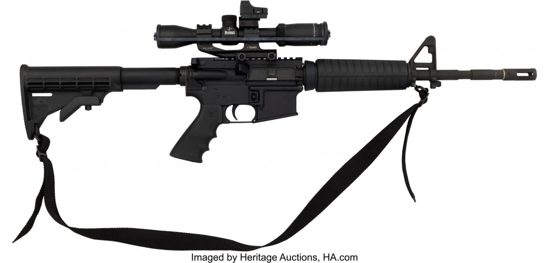 Bushmaster Model XM15-E2S AR-15 Semi-Automatic R: Bushmaster Model XM15-E2S AR-15 Semi-Automatic Rifle with Telescopic Sight. Serial no. BF1609444, .223 / 5.56mm caliber, 16 3/4-inch barrel with ventila