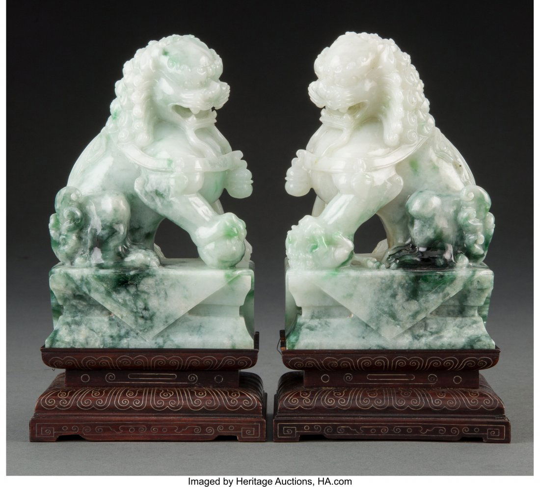 A Pair of Chinese Jadeite Fu Lion Figures, 20th: A Pair of Chinese Jadeite Fu Lion Figures, 20th century 5-1/2 x 3-1/2 x 2-1/2 inches (14.0 x 8.9 x 6.4 cm) (each) HID03101