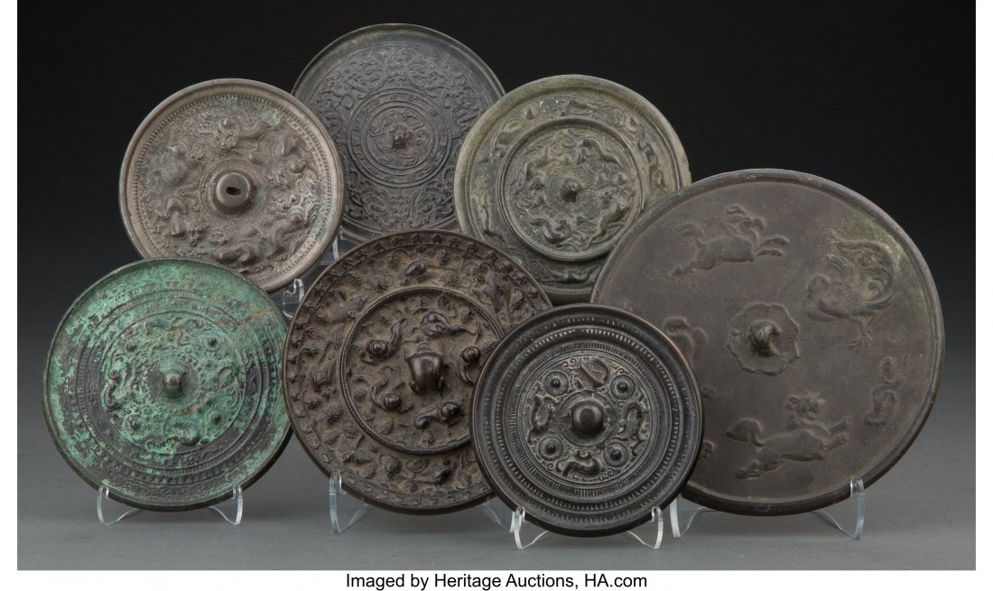 A Group of Seven Chinese Bronze Mirrors 6-1/2 in: A Group of Seven Chinese Bronze Mirrors 6-1/2 inches (16.5 cm) (largest) HID03101062020 © 2020 Heritage Auctions | All Ri