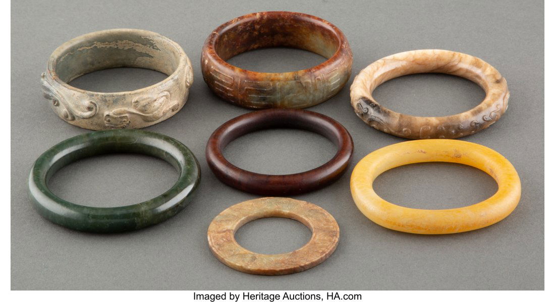 A Group of Seven Chinese Carved Jade and Hardsto (1 of 2)