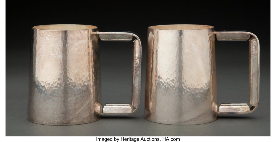 A Pair of William Frederick Hammered Silver Tank: A Pair of William Frederick Hammered Silver Tankards, Chicago, post-1945 Marks: HANDWROUGHT, STERLING, WF 4-1/4 x 3-1/2 x 3-1/2 inches (10.8 x 8&p