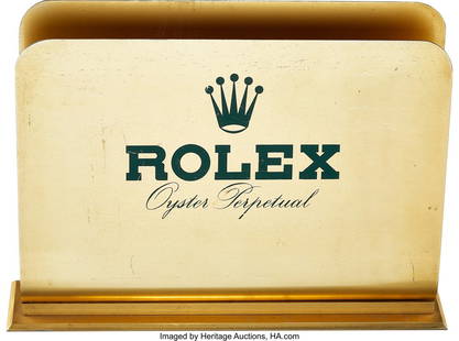 Rolex Brass Vintage Magazine/Catalog Holder (Rol: Rolex Brass Vintage Magazine/Catalog Holder (Rolex Display Advertising) Vintage circa 1970's Rolex brass magazine/catalog holder. Base measures approximately 12 1/2