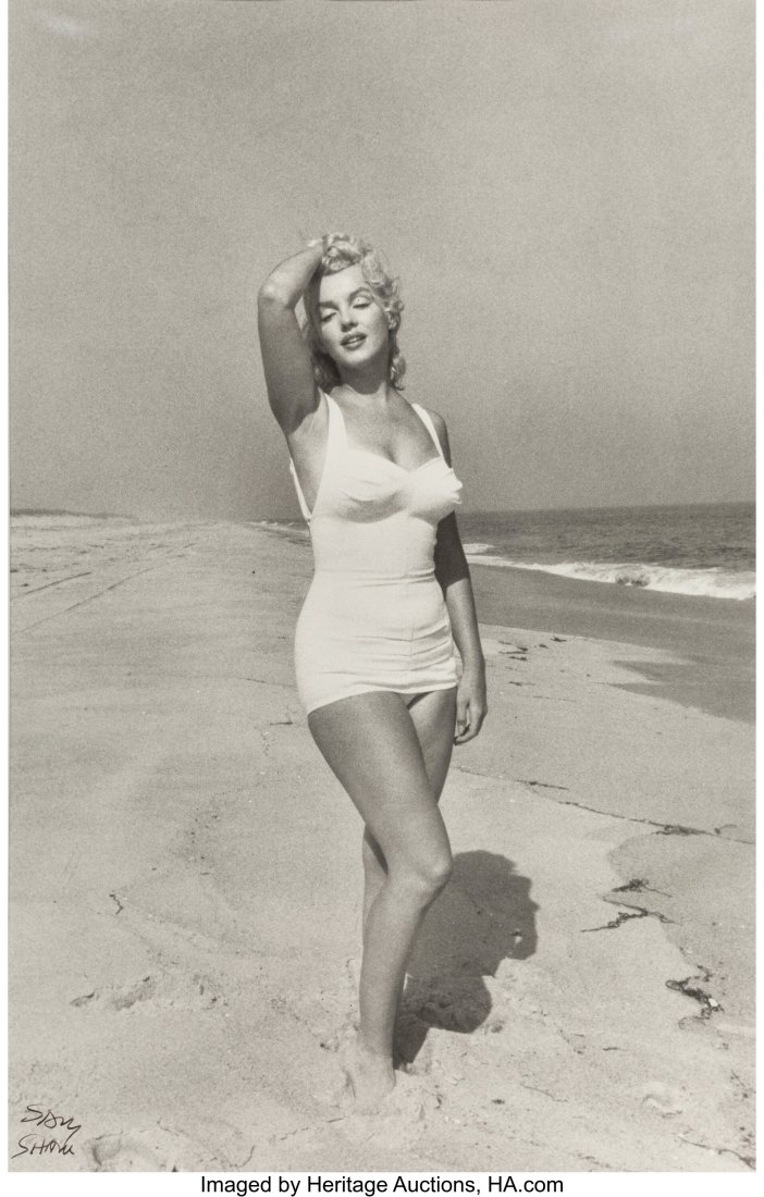 Sam Shaw (American, 1912-1999) Marilyn Monroe, A: Sam Shaw (American, 1912-1999) Marilyn Monroe, Amagansett Beach, New York, 1957 Gelatin silver print, printed later 19-1/4 x 12-5/8 inches (48&peri