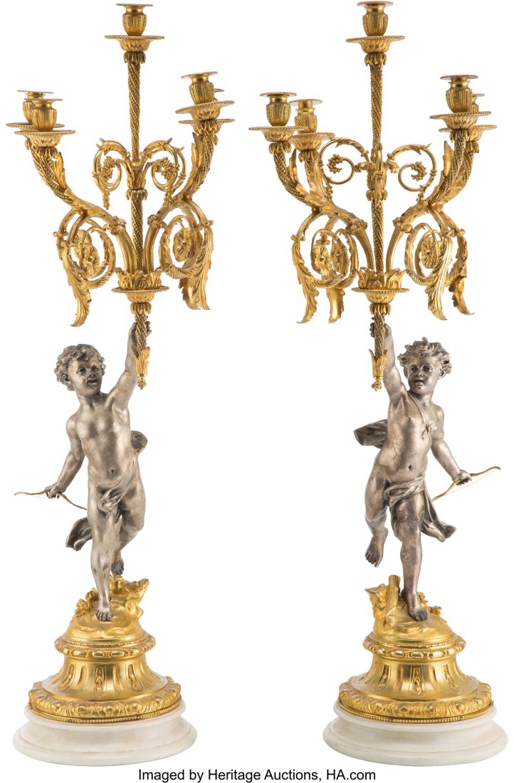 A Pair of Silvered and Gilt Bronze Figural Five-: A Pair of Silvered and Gilt Bronze Figural Five-Light Candelabra, 20th century 44 x 15 x 15 inches (111.8 x 38.1 x 38.1 cm) (each) HID