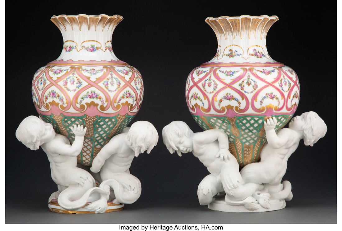 A Pair of Sèvres-Style Figural Bisque and Glaze: A Pair of Sèvres-Style Figural Bisque and Glazed Porcelain Vases, 20th century Marks: Impressed and unglazed pseudo-Sevres marks 15 x 12 x 12 inches (38.1 x 30.5