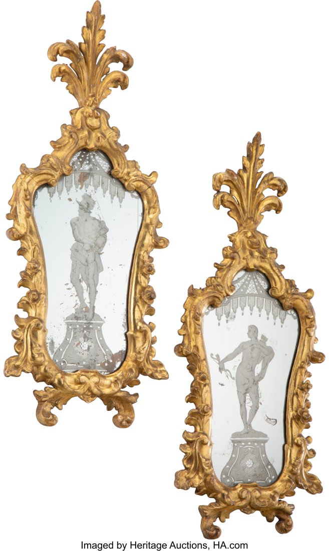 A Pair of Italian Rococo Carved Giltwood Mirrors: A Pair of Italian Rococo Carved Giltwood Mirrors, mid-18th century 31 x 13 x 2 inches (78.7 x 33.0 x 5.1 cm) (each) Property from the Collection of Glori