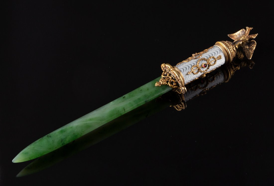 A Nephrite, Gilt Silver, and Guilloché Enamel L: A Nephrite, Gilt Silver, and Guilloché Enamel Letter Opener in the Manner of Fabergé, late 20th century 10-1/4 inches (26.0 cm) 4.8 ounces &