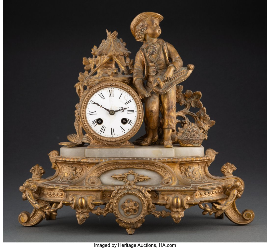 A French Gilt Bronze Organ Grinder Mantle Clock,: A French Gilt Bronze Organ Grinder Mantle Clock, 19th century Marks: 49, PH, M, 82, 3284 13-1/4 x 14 x 5-1/2 inches (33.7 x 35.6 x 14&per