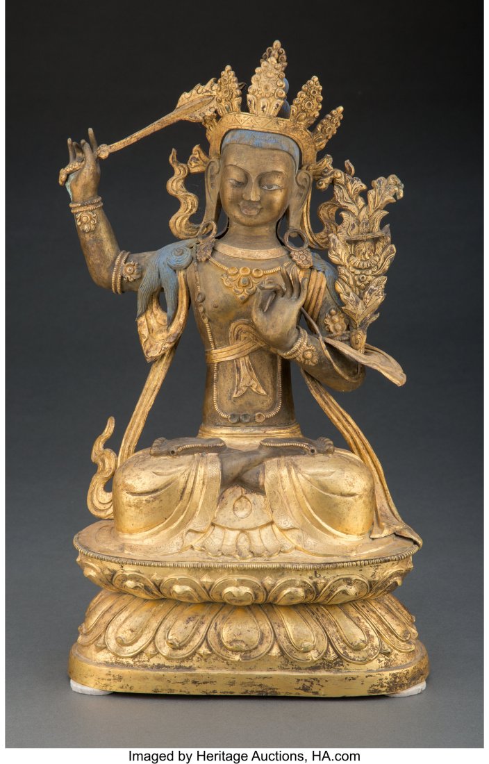 A Chinese Gilt Bronze Seated Buddha 15-1/2 x 8-1: A Chinese Gilt Bronze Seated Buddha 15-1/2 x 8-1/2 x 5-1/2 inches (39.4 x 21.6 x 14.0 cm) Property from a Private Southern California Collector &Ne