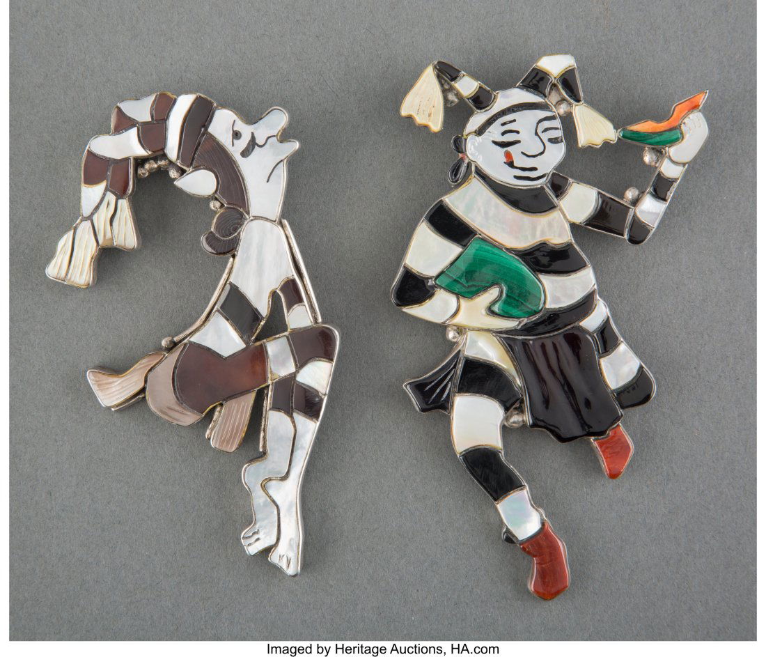 Two Zuni Brooch/Pendants Virgil and Shirley Be: Two Zuni Brooch/Pendants Virgil and Shirley Benn c. 1985 jet, mother-of-pearl, malachite, coral, spiny oyster shell, each signed Virgil & Shirley Benn Prov