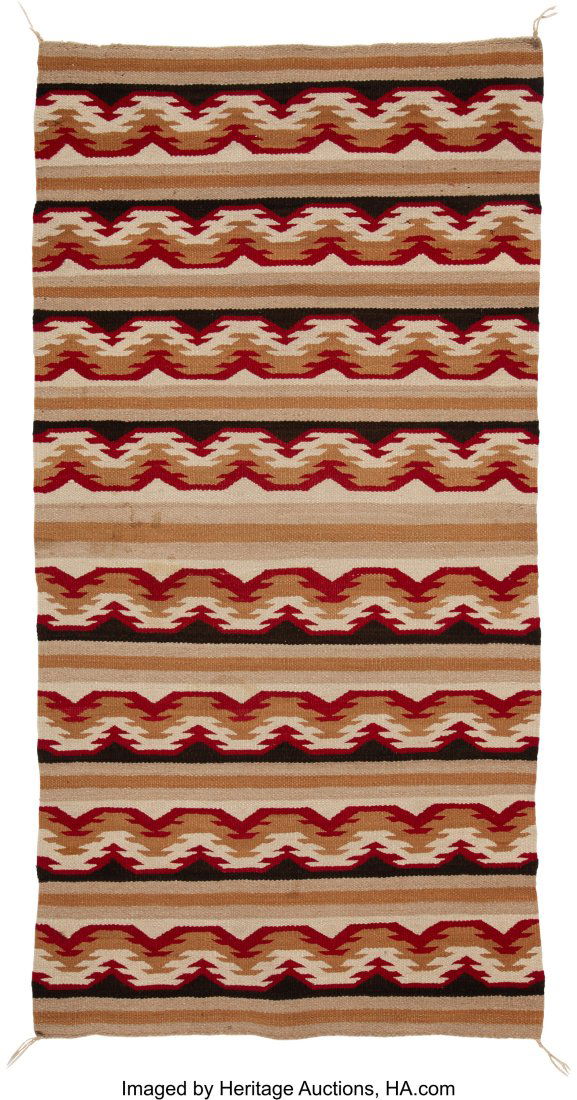 A Navajo Regional Rug Chinle c. 1945 native h: A Navajo Regional Rug Chinle c. 1945 native handspun wool, aniline dyes Provenance: Property from the Donna Gold Family Collection of Ethnographic Art, Los Angeles, CA D