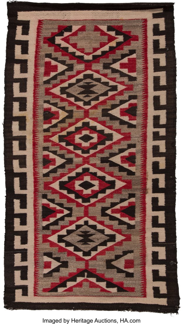 A Navajo Regional Rug c. 1930 Provenance: Prop: A Navajo Regional Rug c. 1930 Provenance: Property from the Donna Gold Family Collection of Ethnographic Art, Los Angeles, CA Dimensions: 61 x 34 inches &NewLi