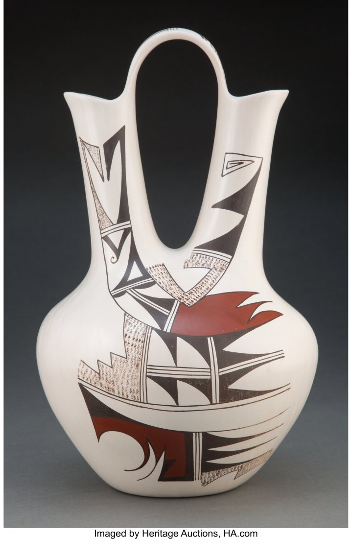 A Hopi Polychrome Wedding Vase Marianne Navasi: A Hopi Polychrome Wedding Vase Marianne Navasie c. 1990 clay, paint, signed with a frog and a tadpole hallmark Provenance: Property from the Donna Gold Family Collection of Et