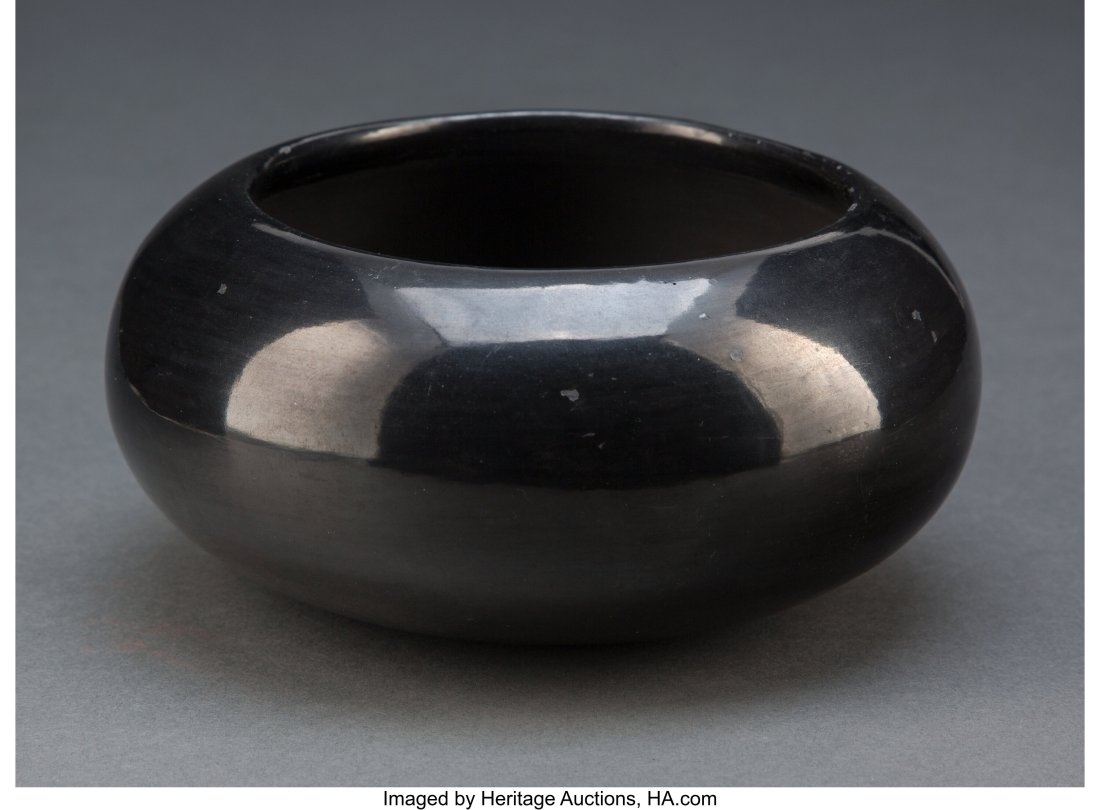 A San Ildefonso Blackware Jar Maria Poveka c.: A San Ildefonso Blackware Jar Maria Poveka c. 1975 clay, with etched signature on the bottom Maria Poveka Diameter: 6 &frac12; inches HID03101062020 &New