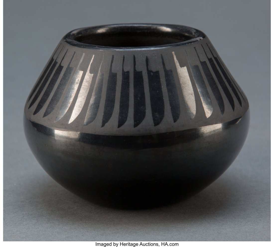 A San Ildefonso Blackware Jar Maria and Santana: A San Ildefonso Blackware Jar Maria and Santana Martinez c. 1950 clay, paint, signed on the base Marie + Santana Diameter: 4 &frac14; inches H