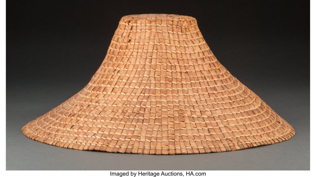 A Haida Plaited Cedar Bark Hat c. 1950 Provena: A Haida Plaited Cedar Bark Hat c. 1950 Provenance: Property from the Finegood Estate, Los Angeles, CA Purchased from Maynard's Industries in 1988. Diameter: 14 &a