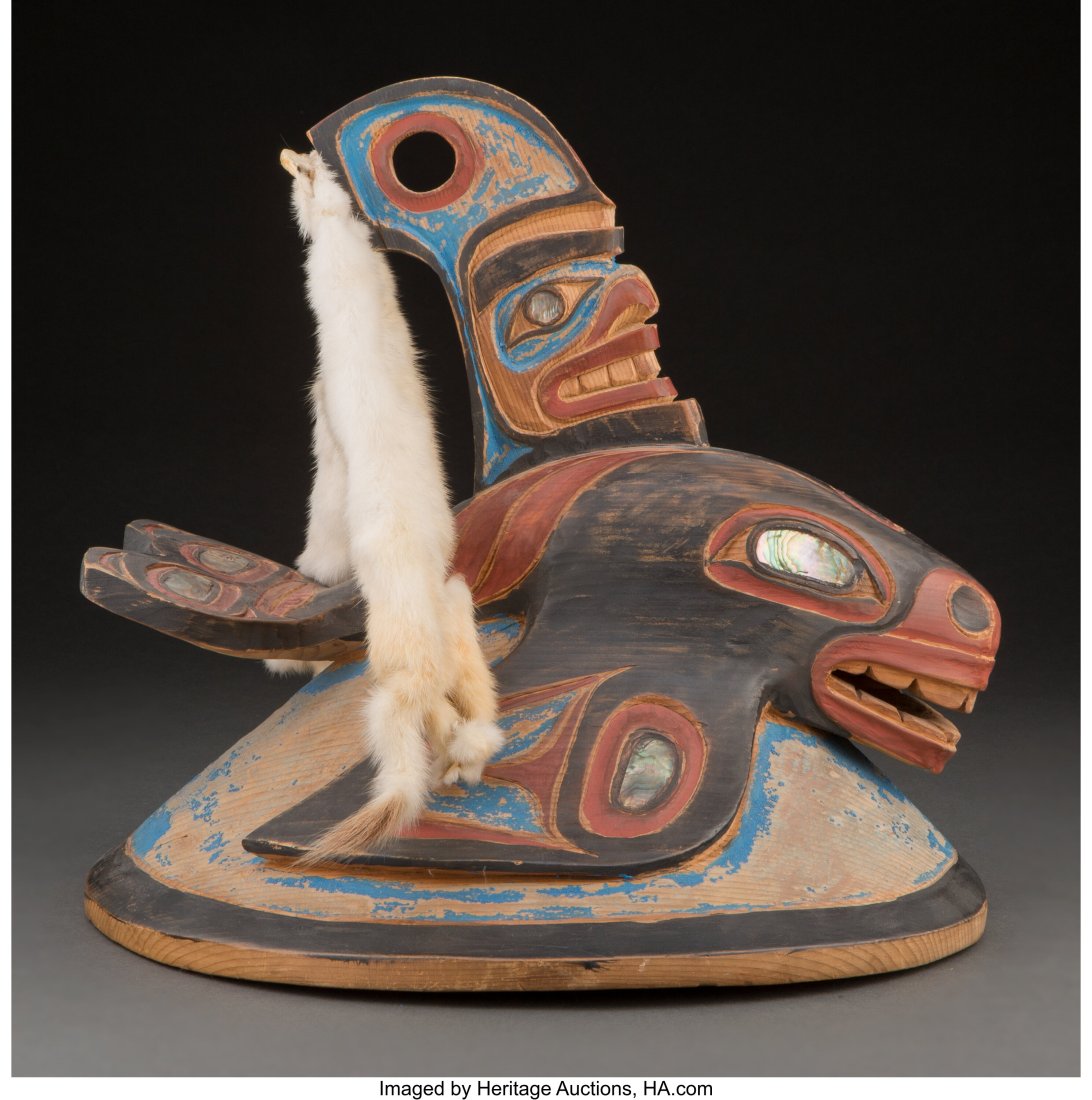 A Tlingit Polychrome Helmet Mask yellow cedar,: A Tlingit Polychrome Helmet Mask yellow cedar, paint, abalone, ermine Provenance: Property from the Finegood Estate, Los Angeles, CA Purchased from Eleanor Tulman H