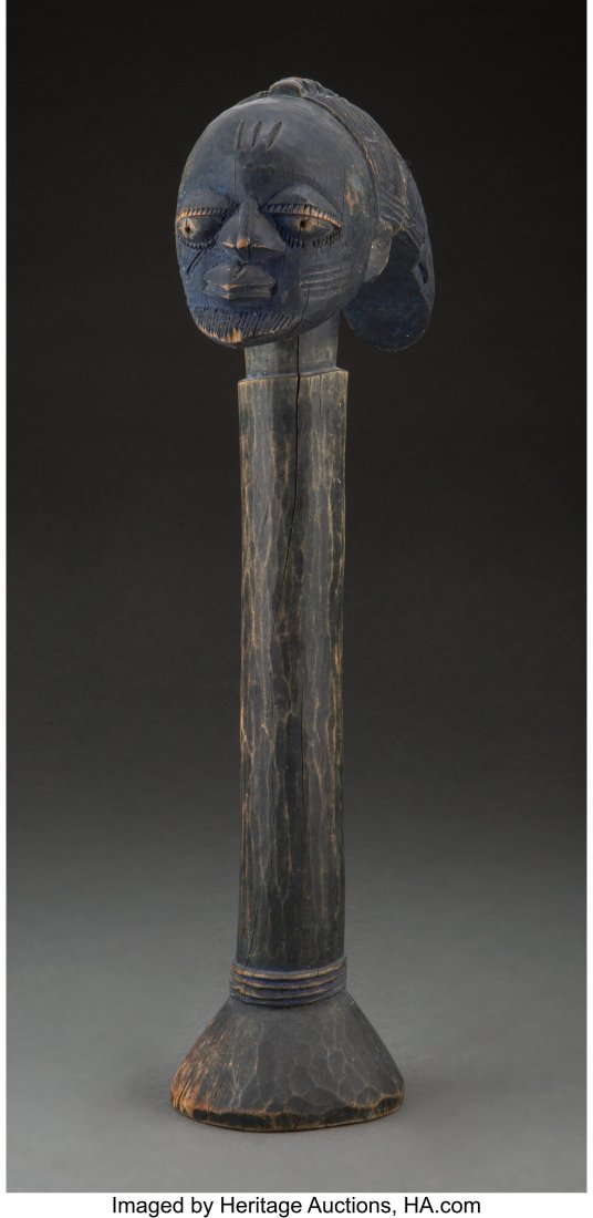 A Yoruba Eshu Scepter Provenance: Property fro: A Yoruba Eshu Scepter Provenance: Property from the Finegood Estate, Los Angeles, CA Height: 16 inches HID03101062020 © 2022 Heritage