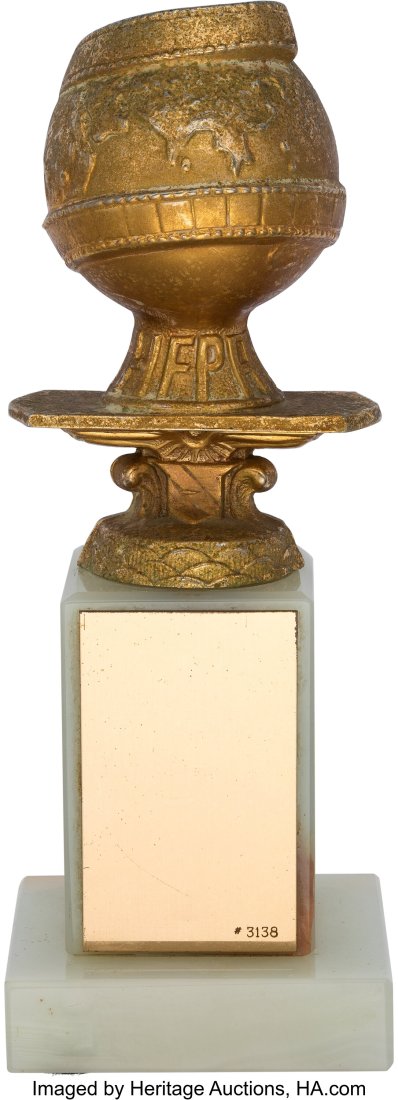 Unpresented Blank Golden Globe Award Trophy (196: Unpresented Blank Golden Globe Award Trophy (1960s). Vintage original trophy consisting of gold-plated cast globe wrapped in a film strip, set atop a tiered pedestal with the HF