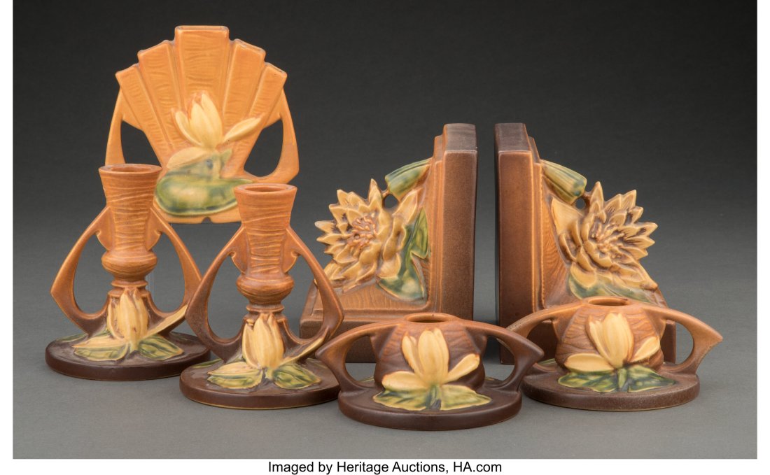 Seven Roseville Glazed Stoneware Water Lily Tabl: Seven Roseville Glazed Stoneware Water Lily Table Articles, circa 1943 Marks: Roseville, U.S.A. (shape and size number) 5-1/4 x 5-1/4 x 4-1&sol