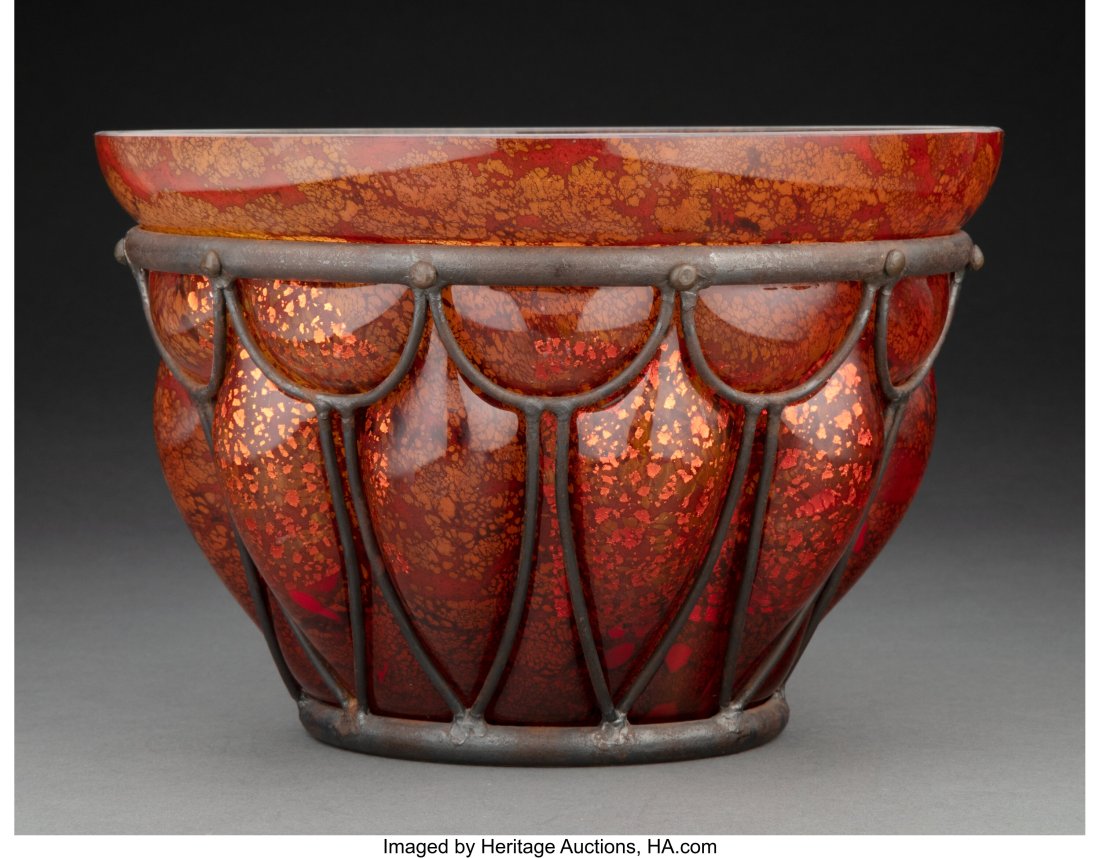 Daum Internally Decorated Blown Out Glass Bowl w: Daum Internally Decorated Blown Out Glass Bowl with Louis Majorelle Wrought-Iron Mount, circa 1925 Marks: Daum (Cross of Lorraine) Nancy, L. Majorelle 7 x 10 inches