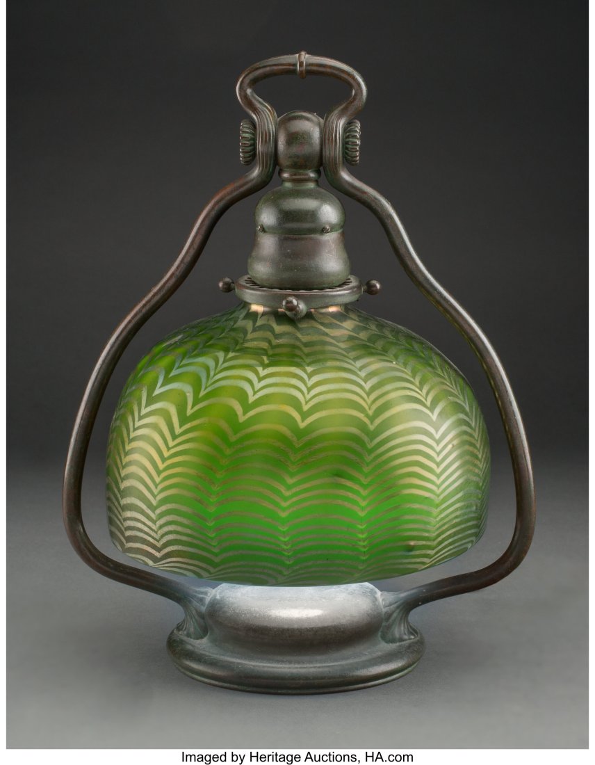 Tiffany Studios Damascene Favrile Glass Shade an: Tiffany Studios Damascene Favrile Glass Shade and Patinated Bronze Harp Lamp, circa 1910 Marks to shade: L.C.T. Marks to base: TIFFANY STUDIOS, NEW YORK&co