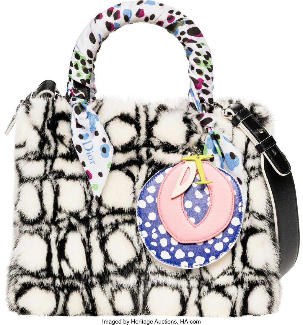Christian Dior Limited Edition White and Black M: Christian Dior Limited Edition White and Black Mink Medium Lady Dior by Daniel Gordon 2016 Condition: 1 11" Width x 8.5" Height x 5" Depth This bag is done in White and Black Mink Fur wit