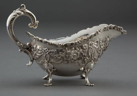 A DUHME & CO. SILVER SMALL REPOUSSÉ SAUCE BOAT: A DUHME & CO. SILVER SMALL REPOUSSÉ SAUCE BOAT The Duhme Company, Cincinnati, Ohio, c