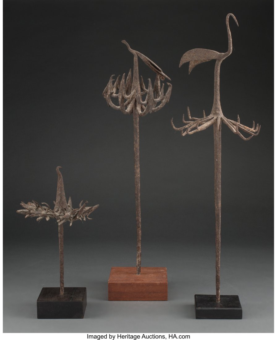 Three Yoruba Iron Staffs, osanyin Nigeria, c. 1: Three Yoruba Iron Staffs, osanyin Nigeria, c. 19th century Each with long shaft supporting an assemblage of abstract birds and a central bird above. Each in very good conditi