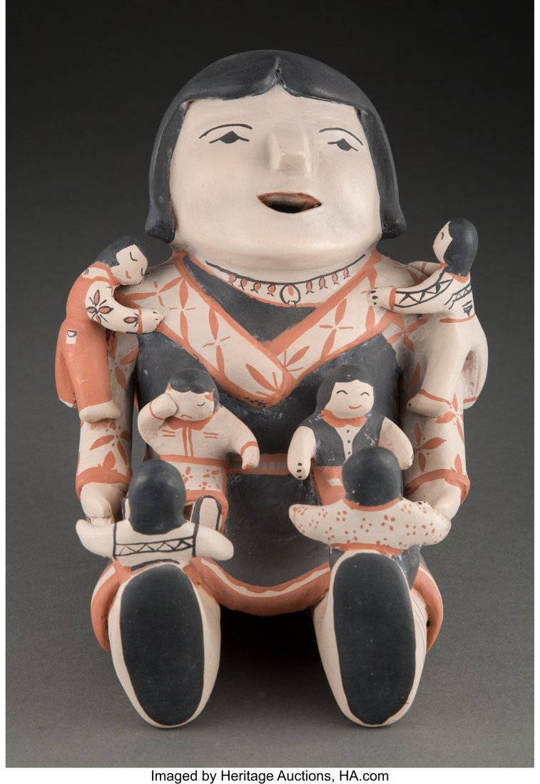 A Cochiti Polychrome Storyteller Ada Suina c. : A Cochiti Polychrome Storyteller Ada Suina c. 1980 clay, paint, signed on the bottom Ada Suina, Cochiti Pueblo Provenance: Property from the Donna Gold Family Collection