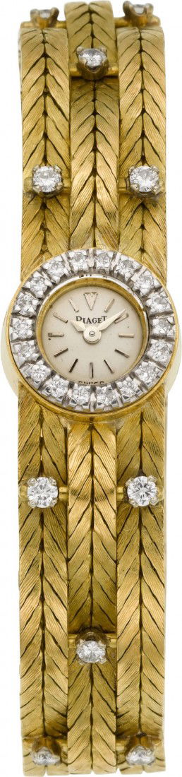 Piaget Lady's Diamond & Gold Bracelet Watch: Piaget Lady's Diamond & Gold Bracelet Watch Case: two body, 18k gold, bezel set with eight