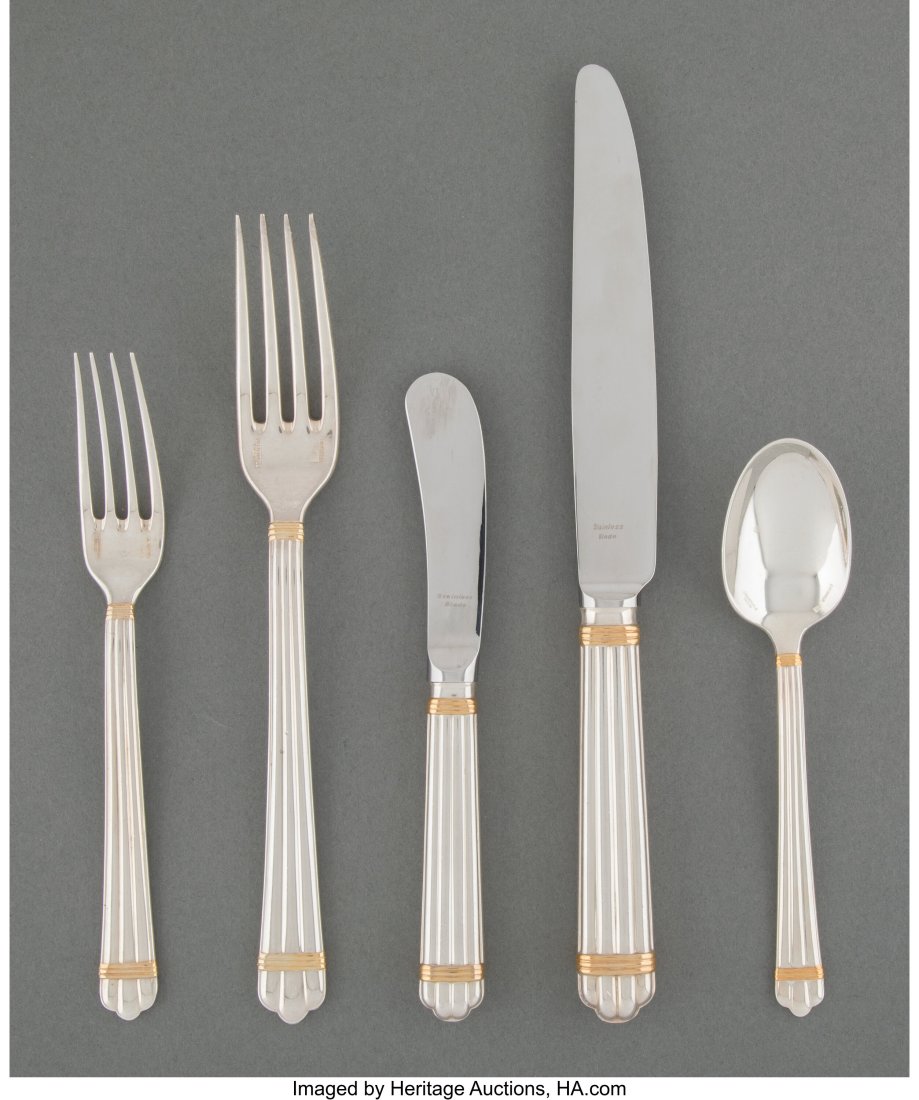 A Fifty-Eight-Piece Christofle Aria Gold Pattern: A Fifty-Eight-Piece Christofle Aria Gold Pattern Partial-Gilt Silver Flatware Dinner Service for Twelve, late 20th century Marks: (O-weights-C), CRISTOFLE, (qual