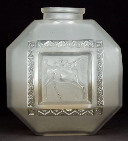 CHARLES SCHNEIDER GLASS VASE The clear glass v: CHARLES SCHNEIDER GLASS VASE The clear glass vase decorated with pressed deer motif