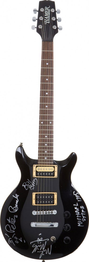 R.E.M. Band-Signed Guitar.: R.E.M. Band-Signed Guitar. A black Slammer Series electric guitar by Hamer, signed on the