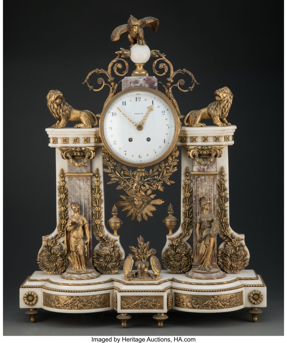 A French Empire-Style Gilt Bronze-Mounted Marble: A French Empire-Style Gilt Bronze-Mounted Marble Mantle Clock Marks: PARIS, 1005 28 x 22-7/8 x 7-3/4 inches (71.1 x 58.1 x 19.7 cm) HID03101062020 &c