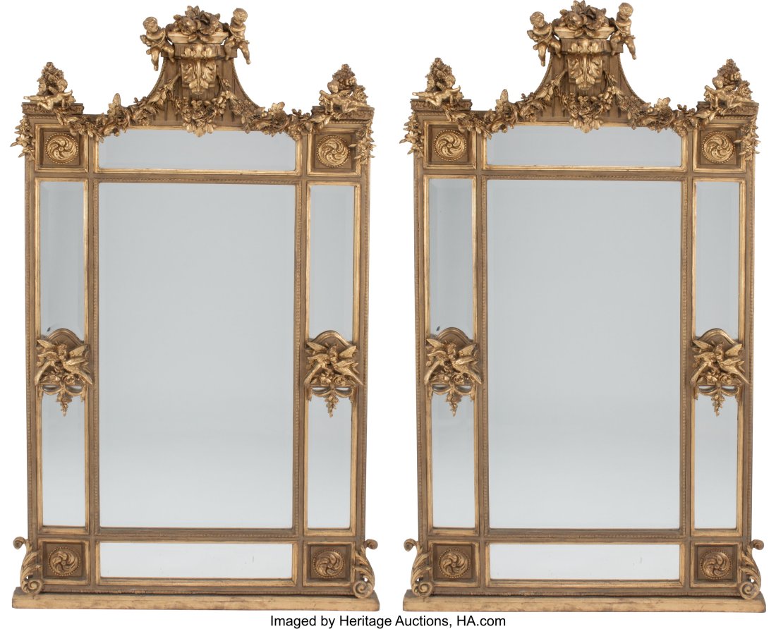 A Pair of Louis XVI-Style Carved Giltwood Mirror: A Pair of Louis XVI-Style Carved Giltwood Mirrors 81 x 43 x 5 inches (205.7 x 109.2 x 12.7 cm) (each) HID03101062020 © 2022 Heritage Auctions | All R