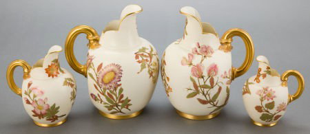 A GROUP OF FOUR ROYAL WORCESTER PORCELAIN PITCHE: A GROUP OF FOUR ROYAL WORCESTER PORCELAIN PITCHERS 1886 Marks: (maroon crown over