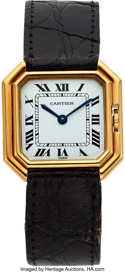 Cartier, 18k Yellow Gold Ceinture Circa 1970's : Cartier, 18k Yellow Gold Ceinture Circa 1970's Case: 27 mm, 18k yellow gold Dial: white dial, signed "Paris", painted black Roman numerals, blued hands Moveme