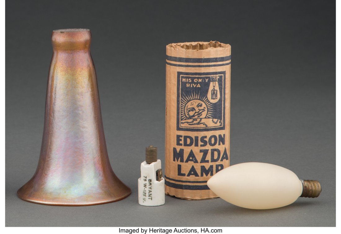 Two Glass Lily Shades, Sixteen Edison Mazda Ligh: Two Glass Lily Shades, Sixteen Edison Mazda Lightbulbs, and Eight Bryant Light Sockets, circa 1920 Marks to one shade: L.C.T. Favrile 4-1/2 x 3 inches 