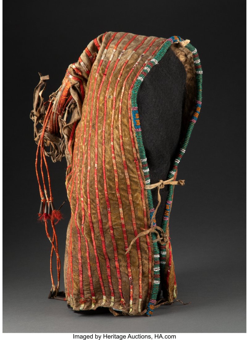 A Sioux Quilled Hide Cradle c. 1885 hide, dyed: A Sioux Quilled Hide Cradle c. 1885 hide, dyed porcupine quills, glass seed beads, thread Height: 18 inches HID03101062020 © 2022 Heritage Auctions | All Right