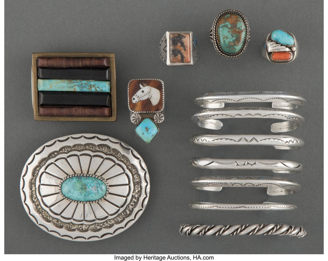 Thirteen Navajo Jewelry Items c. 1975 - 1987 i: Thirteen Navajo Jewelry Items c. 1975 - 1987 including four rings, one etched CR; seven bracelets; and two belt buckles, one stamped AK, the other, T. J