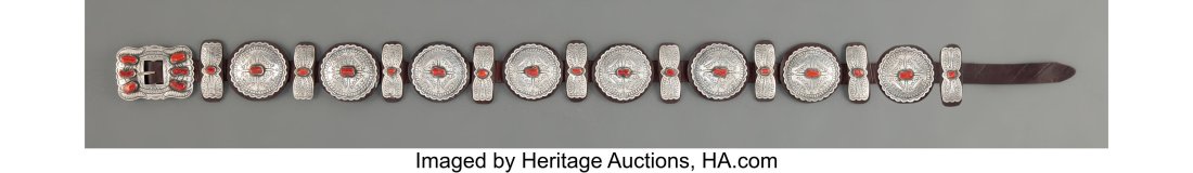 A Navajo Concho Belt Verna Mae Blackgoat c. 1: A Navajo Concho Belt Verna Mae Blackgoat c. 1990 stamped with hallmark and Sterling, silver, coral, commercial leather Lengths: overall, 50 inches; conchas&co