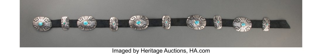 A Navajo Concho Belt Tommy Singer c. 1980 st: A Navajo Concho Belt Tommy Singer c. 1980 stamped Thomas Singer, silver, turquoise, commercial leather Lengths: overall, 37 &frac34; inches; conchos&